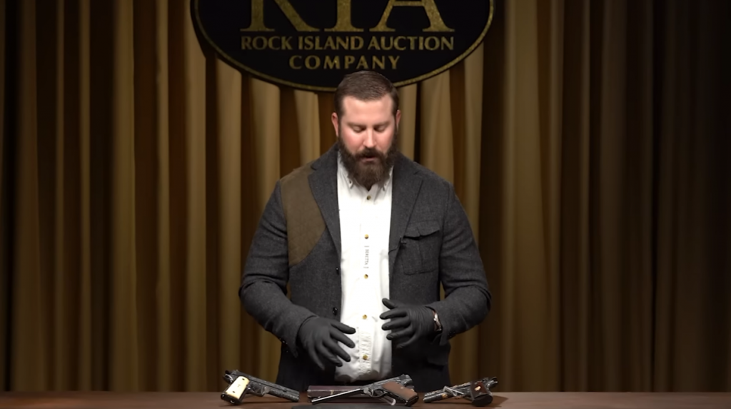 Man presented 3 pistols with Colt Master Engravings