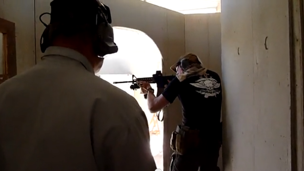 Gunsite instructor and ROBAR General Manager works with student to clear shoot house